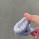 water in motion, opening and closing silicone clip