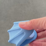 Blue-footed booby clip in motion.  opening wider than traditional clips.  no metal