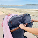 flexible, food-grade silicone Earth whimSi clip that keeps blankets and toys secure.